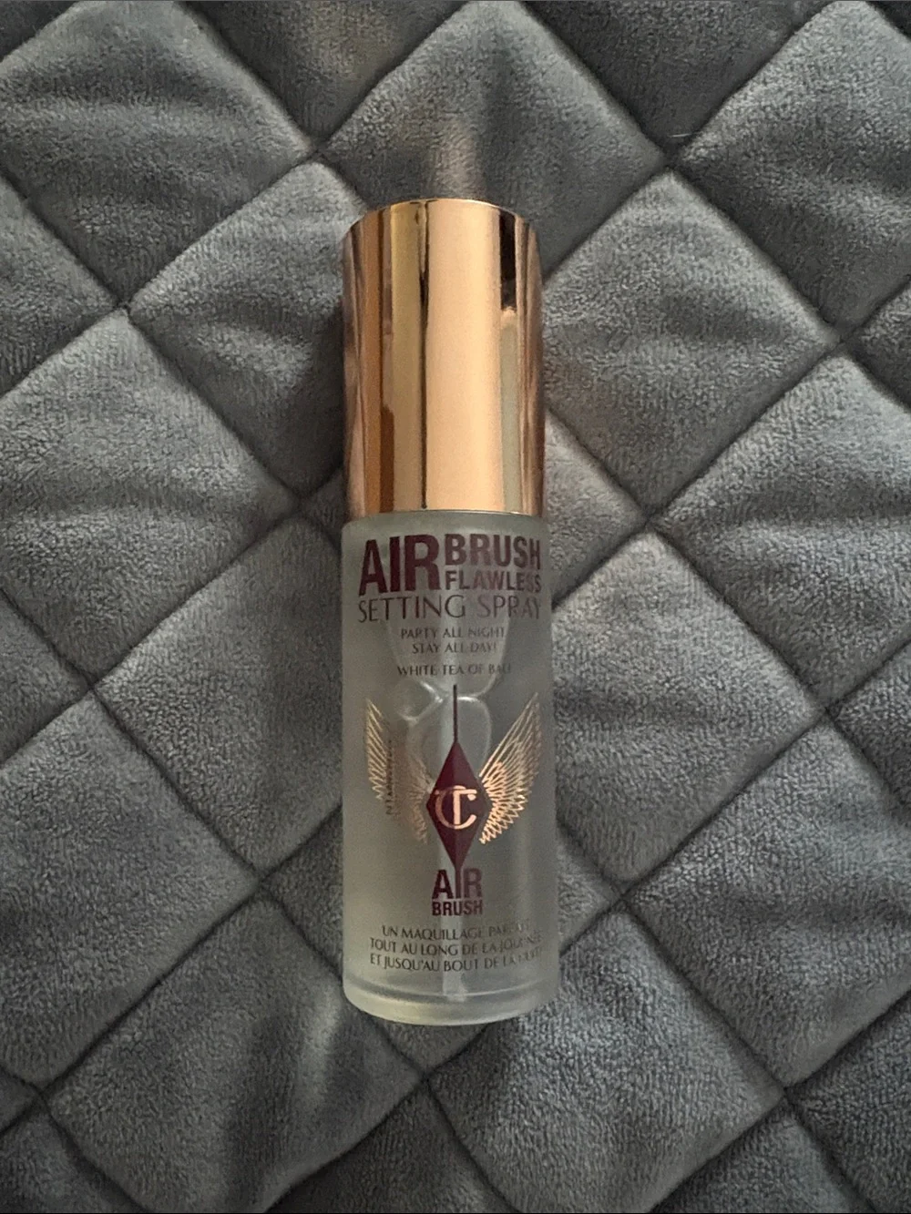 Charlotte Tilbury Airbrush Flawless Setting Spray — Rose Gold Cap, Clear Bottle